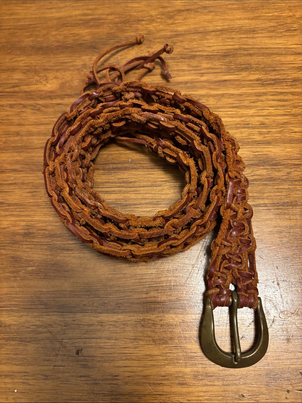 Hand knotted woven genuine leather belt with brass buckle and frayed end - 38” L
